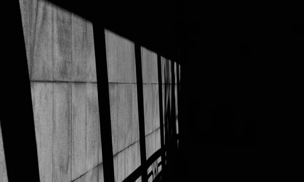 Shadow From Glass Window On Marble Wall In The Room - Monochrome