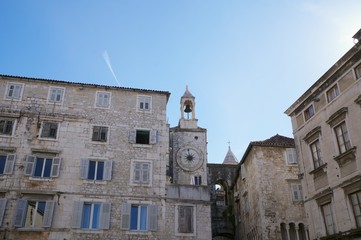 Fototapeta na wymiar Old clock tower at Diocletian Palace in Split, Croatia