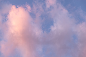 violet clouds on blue sky. background texture.