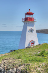 Fototapeta na wymiar Vertical of Boar's Head Lighthouse in Nova Scotia
