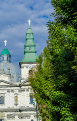 Ancient Catholic church with shiny crosses