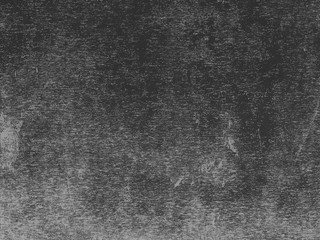 Lino printed texture background in shades of grey.