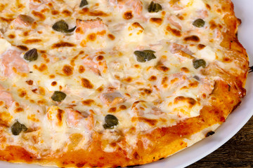 Pizza with salmon and capers