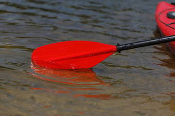 Red paddle for white water rafting and kayaking