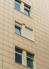 Element of a modern house, windows with plastic electric rolling shutters