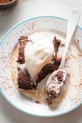 Chocolate brownies with vanilla ice creams