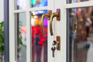 Plastic white door with lock and key