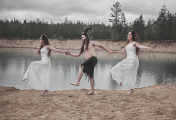 Coven of demons ghost with horns dancing