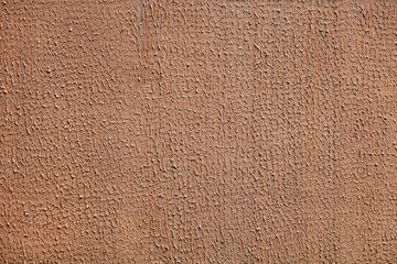 Wrinkled brown decorative stucco surface, abstract texture backdop.