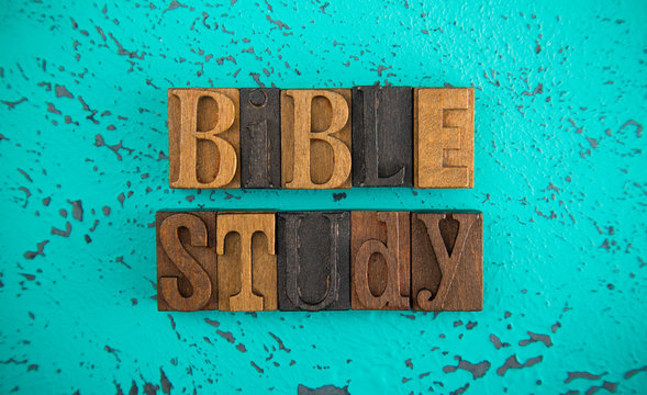 Bible Study Spelled in Wooden Type Set Block Letters on a Turquoise Background
