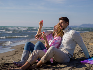 young couple enjoying time together at beach