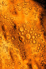 beer goldish oil textures and sparkles macro