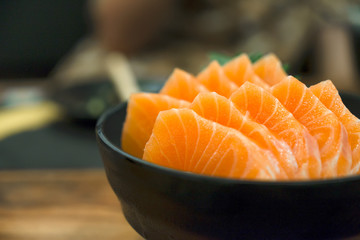 Raw salmon slice or salmon sashimi in japanese food