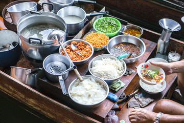 Thai food at Damnoen Saduak floating market on Ratchaburi, Thailand. Its popular for traditional style Thai food and old Thai culture.