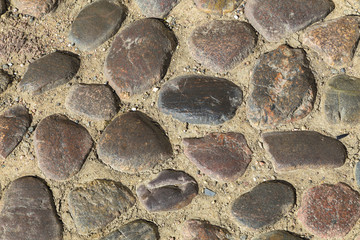 Multicolored stones in ground