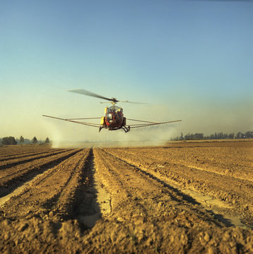 Helicopter crop dusting