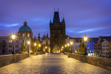 Fototapeta na wymiar Charles Bridge, Prague, Czech Republic. Charles Bridge (Karluv Most) and Old Town Tower at sunrise.