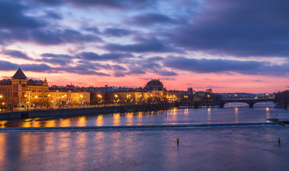 Fototapeta na wymiar View of colorful old town in Prague taken from Charles bridge at sunrise, Czech Republic