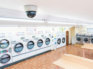 CCTV or surveillance operating in row of washing machine of laundry business in the public store...