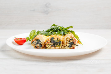 Cannelloni with spinach, cheese and bechamel sauce.