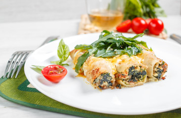 Cannelloni with spinach, cheese and bechamel sauce.