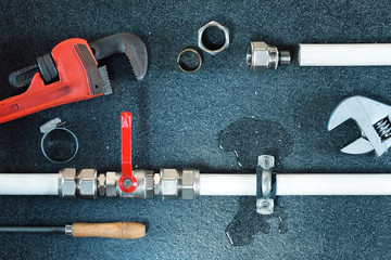 Water leak on a water pipe. Repair plumbing background.
