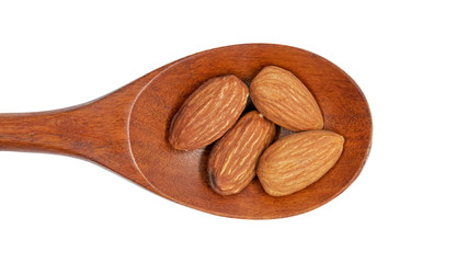 Amonds in wooden spoon