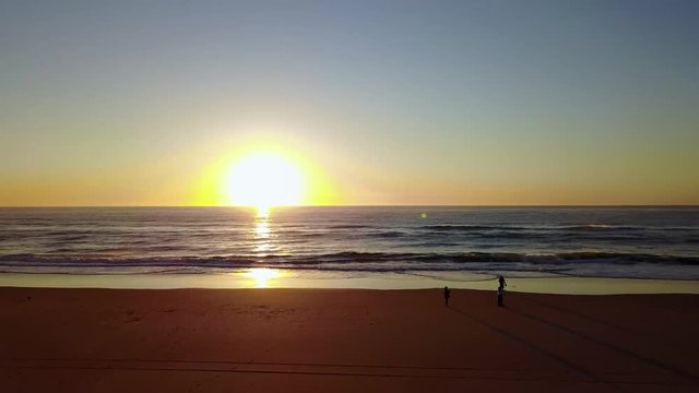 A smooth fly over from the golden beaches of the Gold Coast into a beautiful sunrise over the ocean waves. Shot in 4K on the Mavic Pro.