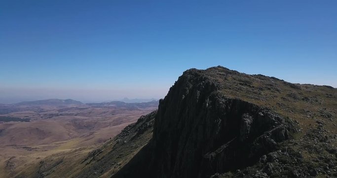 Aerial footage of Mt. Nyangani's peak in the Eastern highlands of Zimbabwe, the highest point in the country.