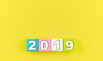 Wooden blocks with 2019 written on. Happy new yew concept. Copy space.