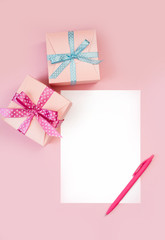 Decorated boxes and blank white sheet of paper.