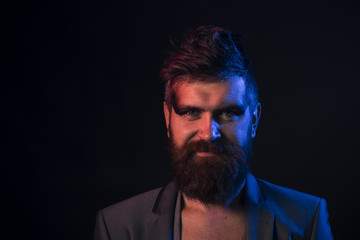 Obraz premium Beard concept. Man with long beard and mustache. Hipster with beard on unshaven face. Beard care and grooming. Styles to fit your lifestyle