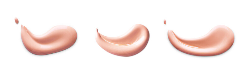 Cosmetic liquid foundation cream smudge smear strokes. Make up smear isolated on white background