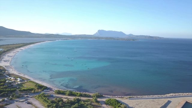 Sardinia aerial view of la cinta beach in San Teodoro shot on sunset with licensed drone

