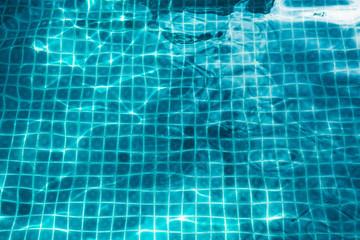 surface of transparent swimming pool water