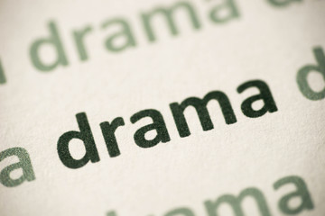 word  drama  printed on paper macro