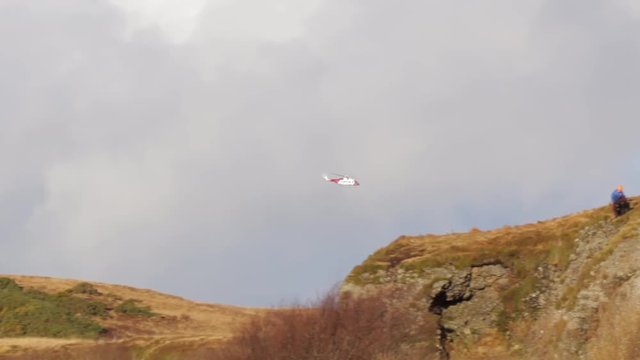 Helicopter in Scottish mountains