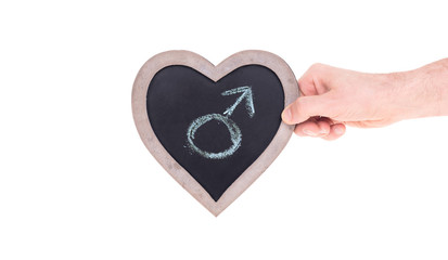 Adult holding heart shaped chalkboard - Male