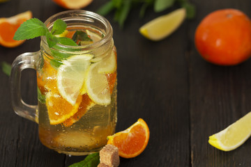 Refreshing summer cocktail with crushed ice and citrus fruits