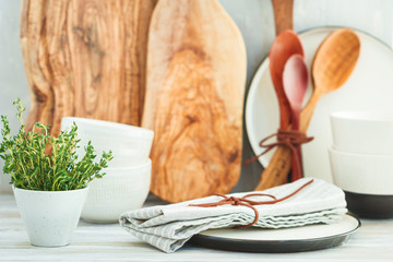 Kitchen utensils on a table in a modern kitchen. The concept of homemade healthy food.