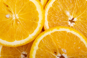 Orange fruit slice. Selective focus and crop fragment