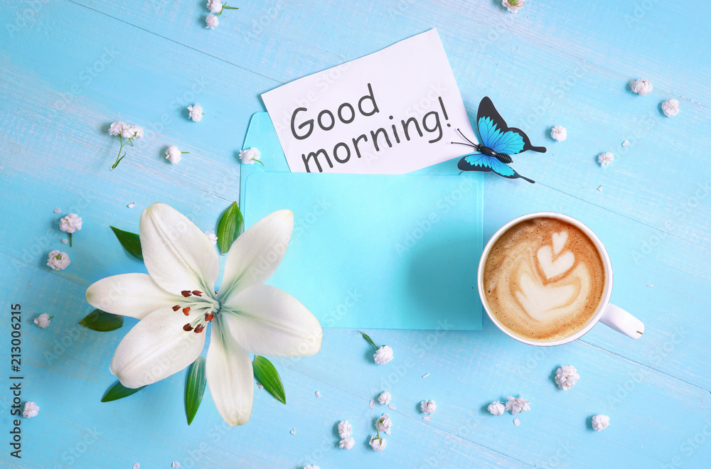 Wall mural Cup of cappuccino coffee, lily flower and  inscription 