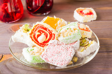 Traditional Turkish Delight. on a saucer  on a wooden table