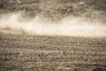 dirt fly after motocross roaring by