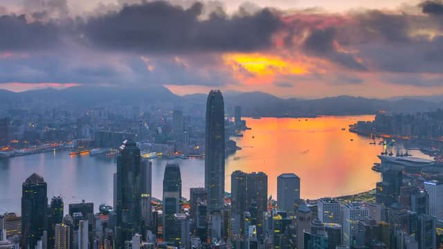 4k timel;aspe day to night sunrise scene of hongkong cityscape view from victoria peak, hongkong