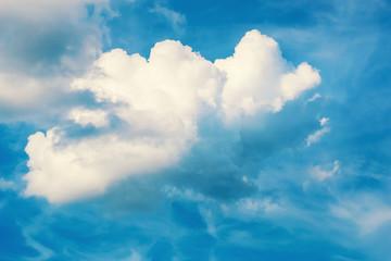 Naklejka na ściany i meble Big white cloud in blue sky