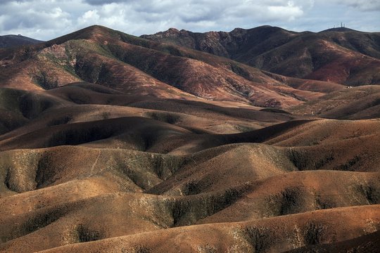 View from the Mirador de Astronomico Sicasumbre to the north on the barren mountains around Pajara, Fuerteventura, Canary Islands, Spain, Europe