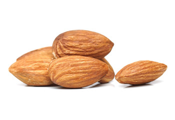 Closeup of a pile of almond isolated on white