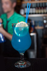 alcoholic drink with lemon and cerry