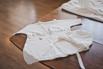 Childrens shirt on the edge of the table 1484.